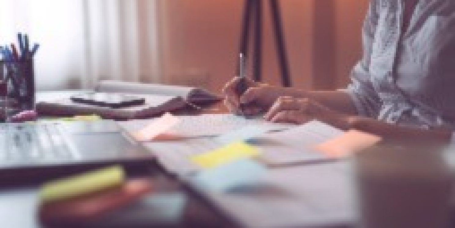 person doing paperwork